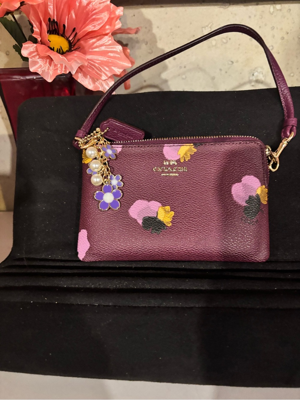 Coach Plum Floral Leather Wristlet with Charm new condition